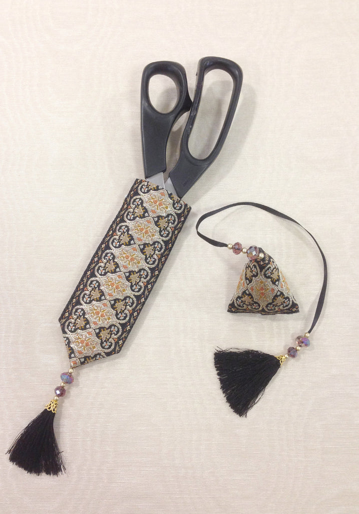 Andalusia - a sewing scissor scabbard and emery humbug