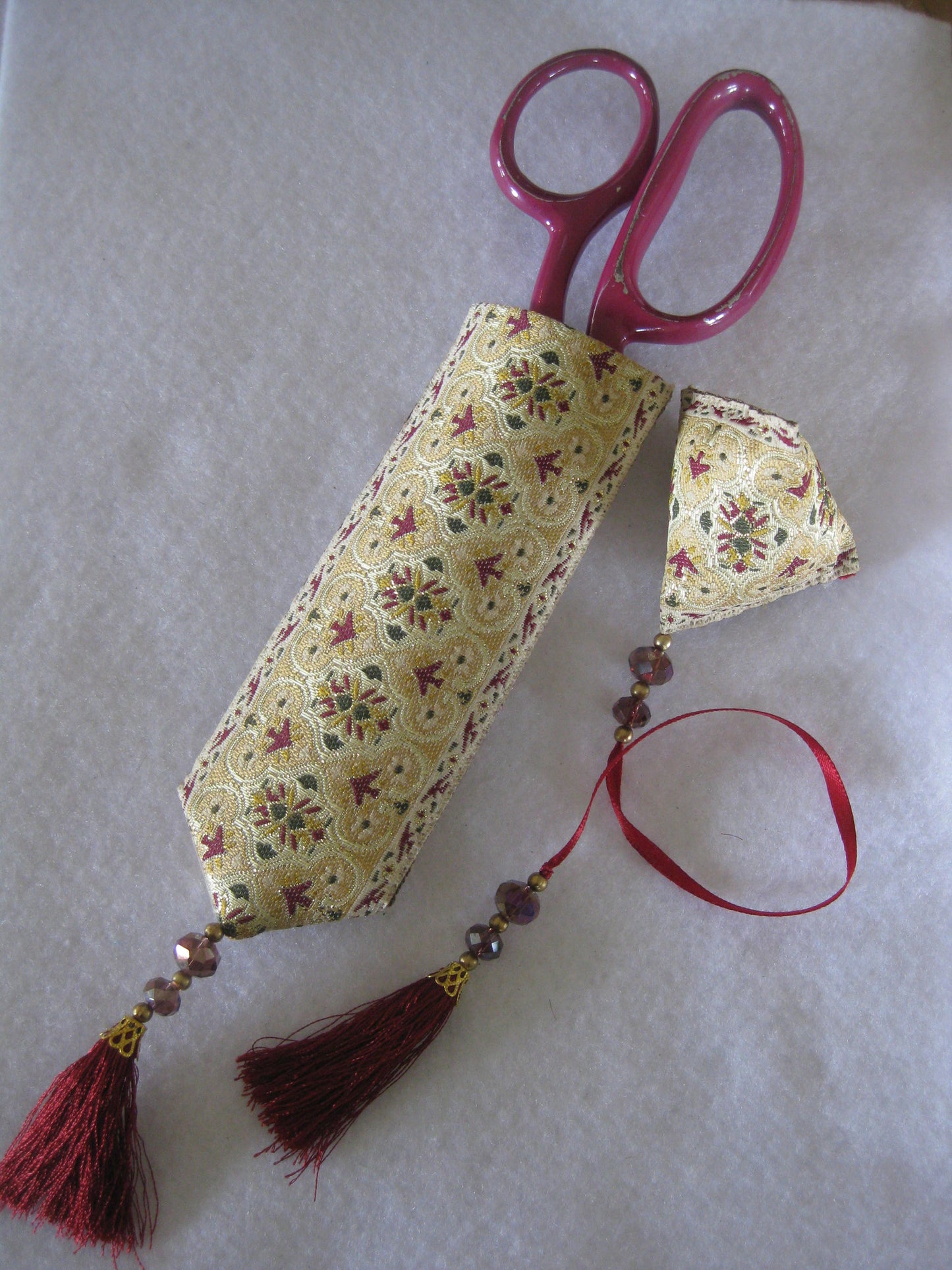 Andalusia - a sewing scissor scabbard and emery humbug